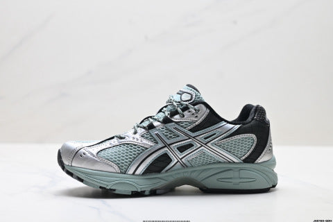 Asics GEL-Nimbus 10.1 Sneakers: Trendy, durable, and casual running shoes with patchwork construction.