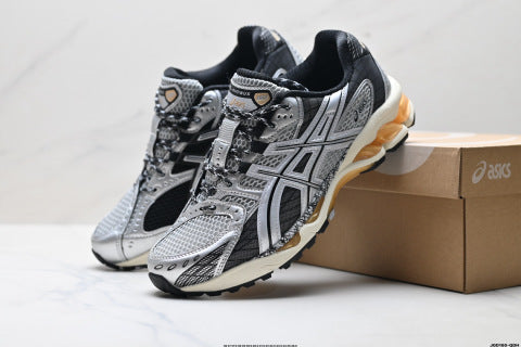 Asics GEL-Nimbus 10.1 Sneakers: Trendy, durable, and casual running shoes with patchwork construction.