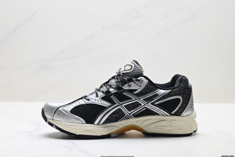 Asics GEL-Nimbus 10.1 Sneakers: Trendy, durable, and casual running shoes with patchwork construction.