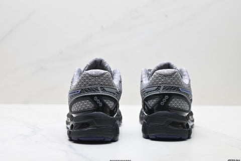 Asics Gel-Kayano 20 Sneakers: Comfortable, versatile, durable, breathable, low-top running shoes.