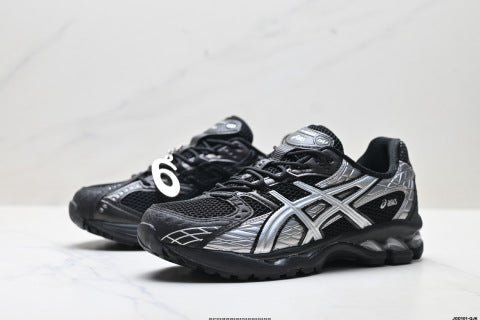 Asics GEL-Nimbus 10.1 Sneakers: Trendy, durable, low-top casual running shoes with patchwork design.