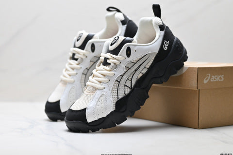 Asics Gel-Truck athletic shoes, designed for hiking, trekking, shock absorption, slip resistance, durability, balance, and lightweight performance.